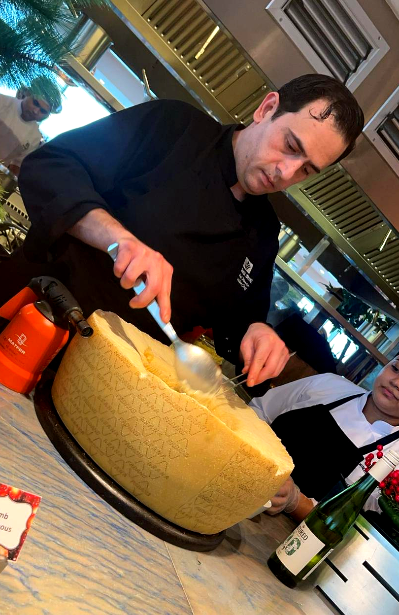 Parmesan wheel live station