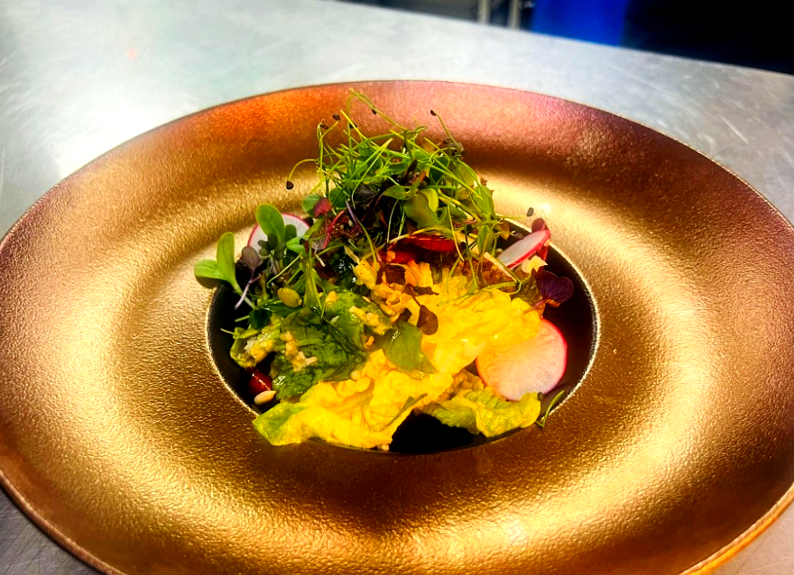 Michel Karam signature dish on gold plate